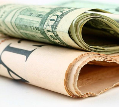 newspaper-money-display