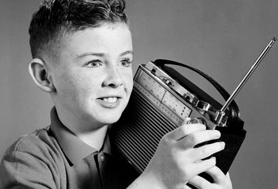 American Boy listening to portable radio --- Image by   H. Armstrong Roberts/CORBIS